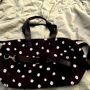 Small floral duffel bag with shoulder strap